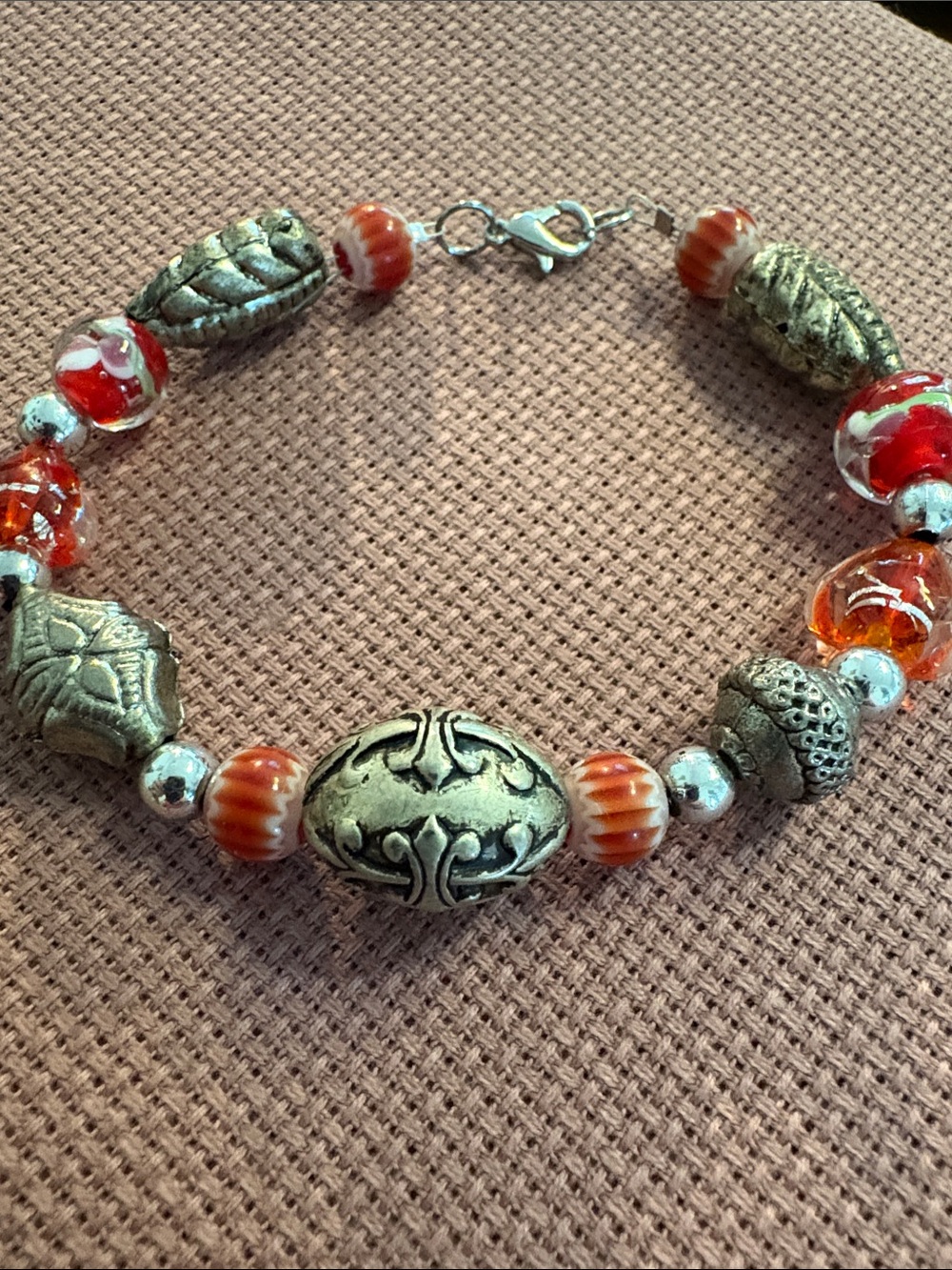 Artisan Red Glass Bead Bracelet Silver
tone accents